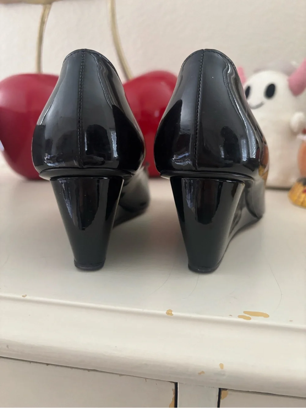 Prada Black Patent Leather Peep-Toe Wedges with Bow and Gold Accent